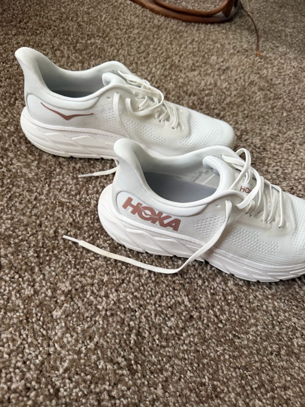 Hoka White Athletic Running Shoes with Rose-Gold Logo Accent